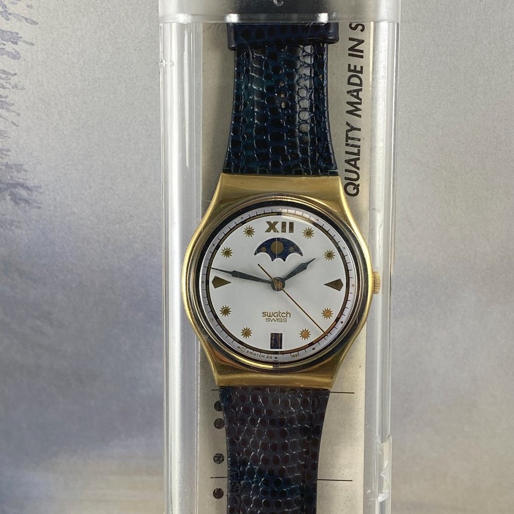 Rare NEW Swatch Watch Moon Phase Gold Tone Navy  Price is Firm